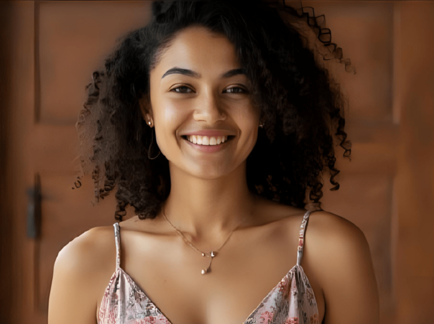 Woman smiling confidently with healthy glowing skin